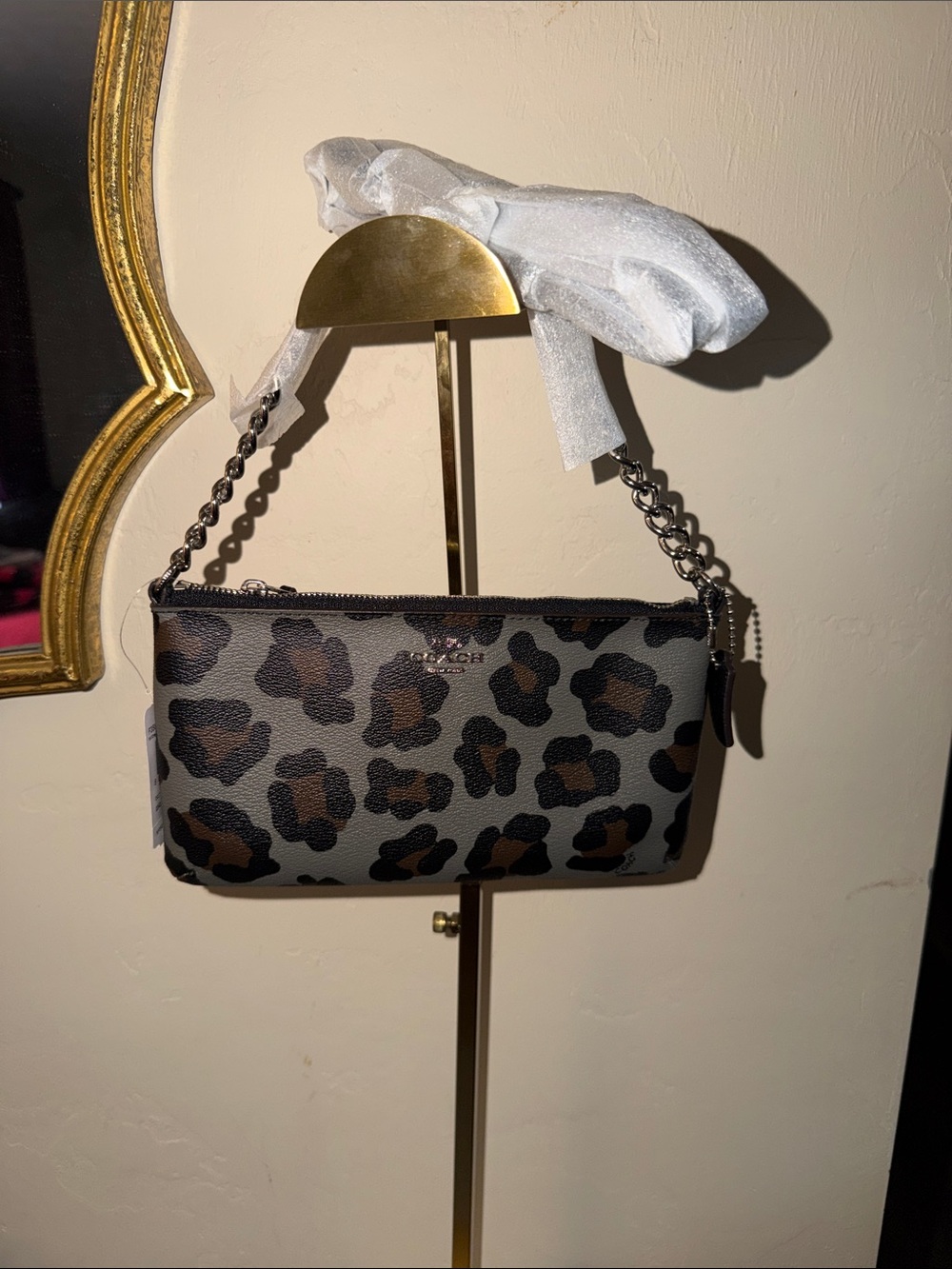 This is a Coach Quinn Crossbody in Ocelot Printed Haircalf